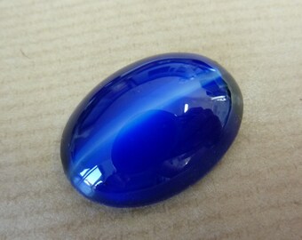 1 verre cabochon, 25x18mm, bleu ovale blanc,