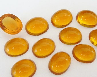 12 glass cabochons, 10x8mm, topaz, oval