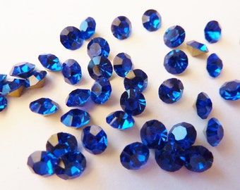 24 rhinestones SS23, Ø5mm, dark sapphire