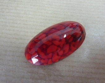 1 glass cabochon, 31x17mm, marbled red, oval