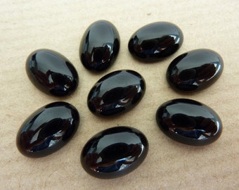 4 glass cabochons, 14x10mm, opaque black, oval