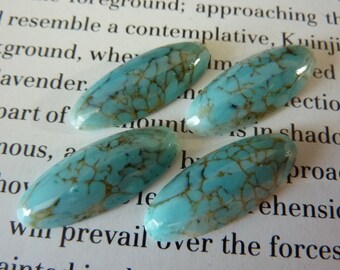 4 glass cabochons, 25x10mm, light blue marbled