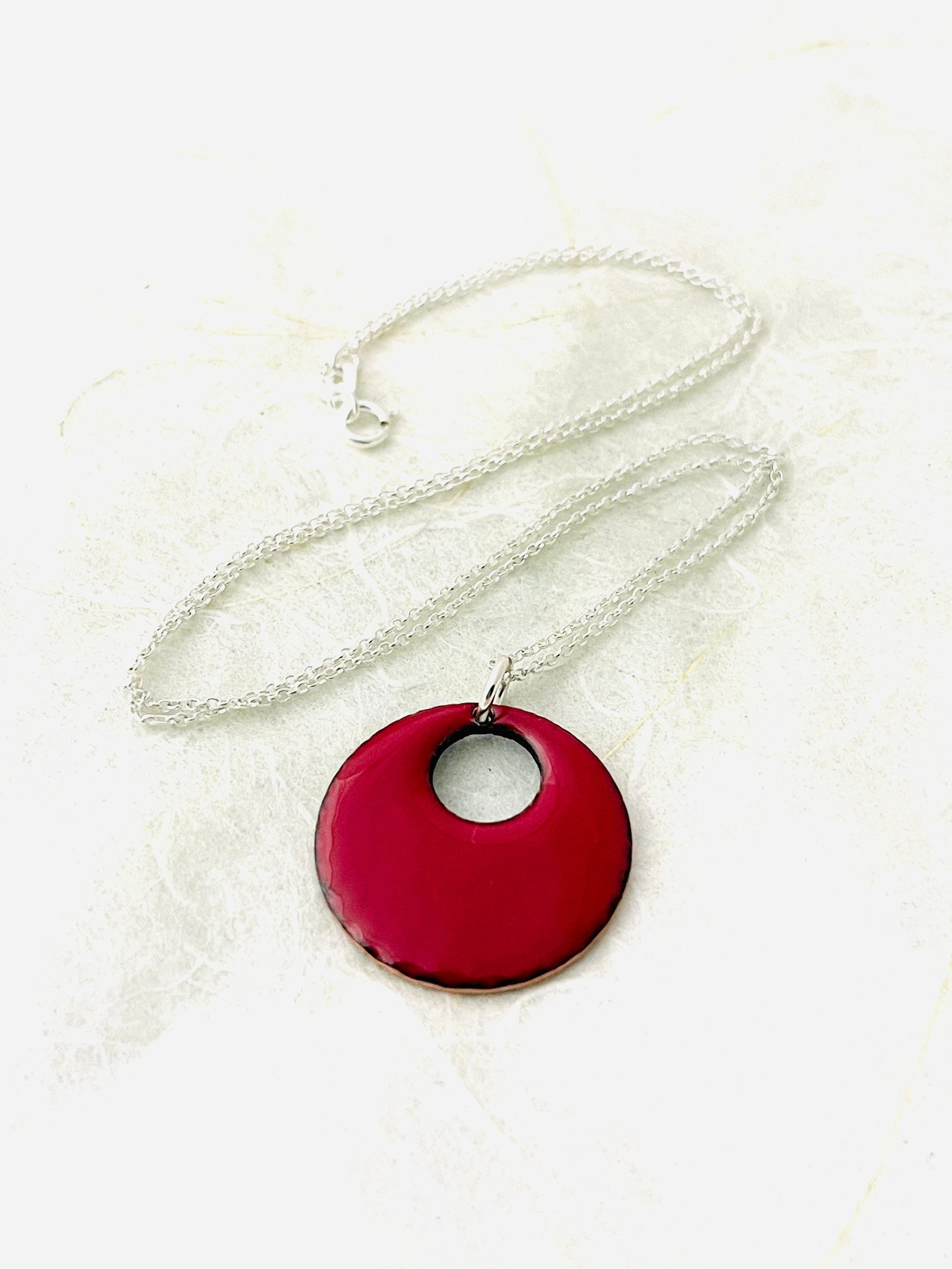 Large red pendant best sale necklace