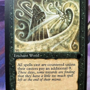 May include: A black Magic: The Gathering trading card titled Nether Void. The card features a dark, swirling illustration of a hooded figure and text that reads: All spells cast are countered unless their casters pay an additional 3.