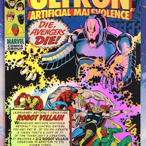 May include: A rectangular trading card featuring a comic book cover illustration of Ultron, Iron Man, Thor, and Vision. The card displays the text "ULTRON ARTIFICIAL MALEVOLENCE" and "DIE, AVENGERS.. DIE!" with game rules and stats printed in a yellow box.