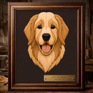 May include: A framed intarsia wood art piece featuring a golden retriever head with light and dark wood tones, a black nose, and a pink tongue. The artwork is set against a dark background and includes a brass plaque reading DOG INTARSIA. ARTISTRY BY.
