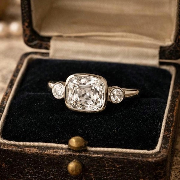 Cushion Cut Moissanite Engagement Ring • Bezel Set Sterling Silver Three Stone