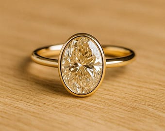 Owalny pierścień z moissanitem • Srebrna oprawa z solitaire'em 925