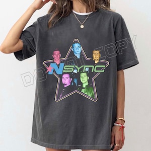 May include: A set of three ceramic mugs with a speckled, matte finish. The mugs are in shades of cream, light gray, and dark gray. Each mug has a simple, minimalist design, perfect for coffee or tea.