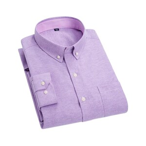 A lilac button-down shirt with a button-down collar and a chest pocket. The shirt is neatly folded, showing the buttoned cuffs and the striped lining of the collar.