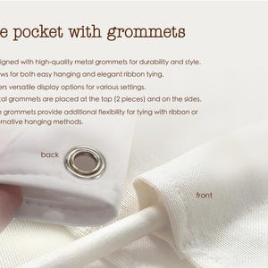 a close-up view of a pole pocket with groomsets, with a hand holding the pocket and a white fabric visible.