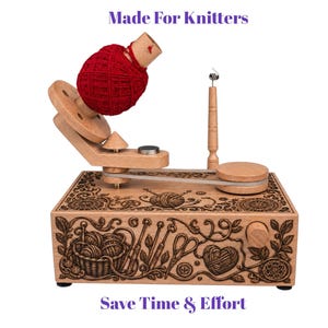 May include: A wooden yarn ball winder featuring a red yarn ball, a vertical spindle, and a belt-driven mechanism. The base is decorated with laser-engraved illustrations of knitting supplies. Text reads: Made For Knitters and Save Time & Effort.
