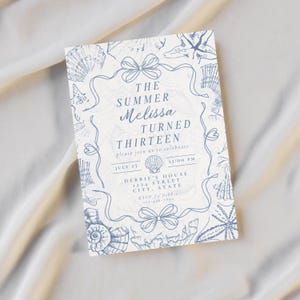 May include: A white invitation card with blue seashell illustrations and text. The text reads "The Summer Melissa Turned Thirteen" with event details. The card is decorated with bows and ribbons.