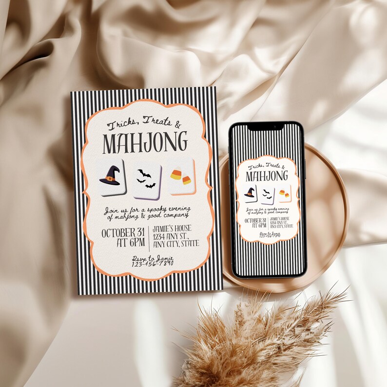May include: A rectangular invitation card and a smartphone displaying the same design, both featuring black and white vertical stripes, an orange scalloped border, and the text Tricks, Treats & MAHJONG with illustrations of a witch hat, bats, and candy corn.