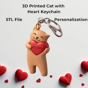 May include: A 3D-printed cat keychain in a light brown color, holding a red heart with the word "name" on it. The keychain has a silver clasp and ring. The text "3D Printed Cat with Heart Keychain", "STL File", and "Personalization" are also visible.