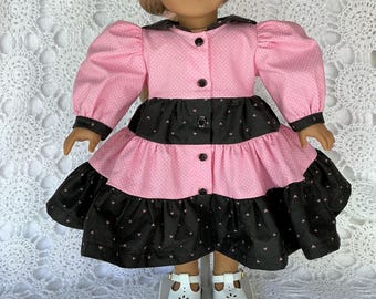 18 inch doll dress. Fits American Girl Dolls. Pink and black ruffled print.