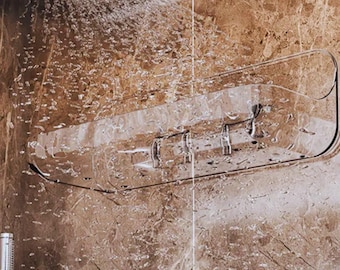 Estante de baño transparente montado en la pared