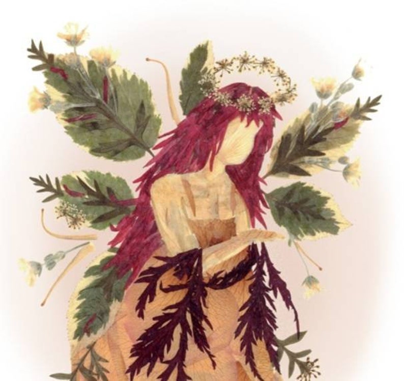 May include: A floral art piece depicting a fairy with long red hair, wearing a crown of flowers and a dress made of dried leaves and flowers.