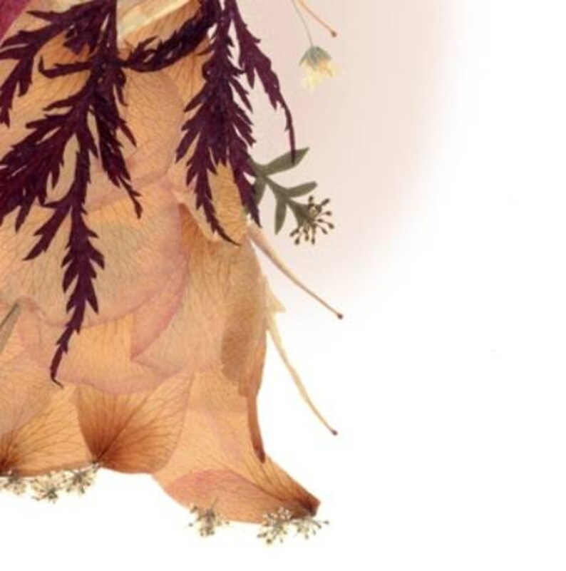 May include: A delicate arrangement of dried flowers and leaves, featuring a variety of textures and colors. The arrangement is primarily composed of beige and brown petals, with accents of deep purple and green.