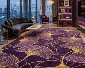 May include: A large rectangular area rug featuring a deep purple background with a repeating gold ginkgo leaf pattern. The design consists of stylized, fan-shaped leaves with intricate gold line details that create a flowing, organic aesthetic.
