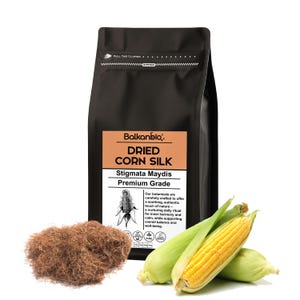 May include: A black bag of Balkanbio Dried Corn Silk, Premium Grade, with text and a corn graphic. Beside the bag are two ears of corn and a pile of dried corn silk. The text on the bag says "Our botanicals are carefully crafted to offer a soothing, authentic touch of nature."