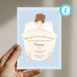 May include: A pale blue invitation for a bachelorette spa weekend. The design features a woman in a bathtub, with the text "Before saying 'I do,' she needs time with you!" and event details. The invitation is held by a hand.