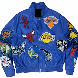 May include: A blue bomber jacket featuring multiple NBA team logos, including the Lakers, Knicks, and Bulls. The jacket has a button-up front, a collar, and ribbed cuffs. The logos are in various colors and designs.