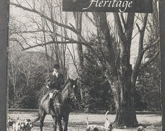 May include: Black and white photograph of a book cover titled "Northern Virginia Heritage." The image depicts a person on horseback, followed by a pack of hounds in a grassy field, with trees in the background.