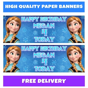 May include: Two paper banners with the text "Happy Birthday Megan 4 Today" and an image of a cartoon character. The banners are on a blue background with snowflakes. The top banner reads "High Quality Paper Banners".