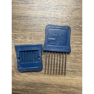 May include: A handmade wooden sign with the text "Welcome to our home" in a handwritten style. The sign is painted white with black lettering and a distressed finish, measuring approximately 12 inches wide and 6 inches tall.