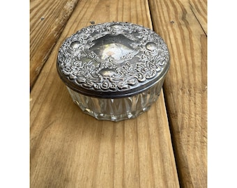 Tarro de cristal y polvos de plata antigua con espejo