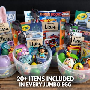 May include: Five clear plastic Easter baskets filled with toys, books, and sunglasses. Each basket has a name tag. The text "20+ ITEMS INCLUDED IN EVERY JUMBO EGG" is at the bottom. The baskets are on a wooden surface.