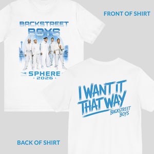 May include: A white short-sleeved t-shirt featuring a graphic of the Backstreet Boys on the front with the text BACKSTREET BOYS SPHERE 2026. The back of the shirt displays the blue text I WANT IT THAT WAY and BACKSTREET BOYS in a brush font.