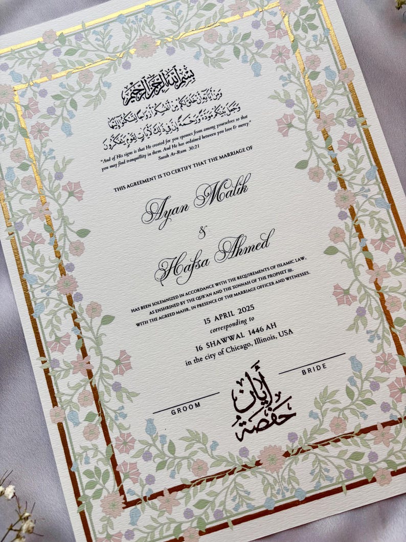 May include: A wedding certificate with floral border and gold accents. The document features the names Ayan Malik and Hafsa Ahmed, along with Arabic script and English text. The date of the marriage is April 15, 2025, in Chicago, Illinois.