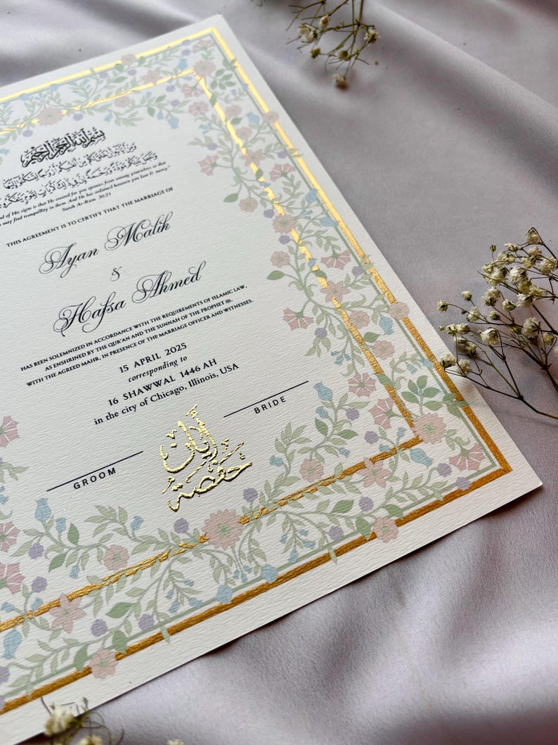 May include: A wedding certificate with floral border in pastel colors and gold accents. The names Ayan Malik and Hafsa Ahmed are featured, along with the date April 15, 2025. The certificate includes Arabic script and is for a wedding in Chicago, Illinois.