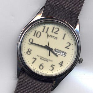 Gent&#39;s Lorus Silver-Tone Quartz Day Date Watch V633-OA88