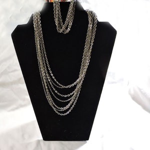 Avon Retro Silver-Tone Elegant Necklace and Bracelet Set