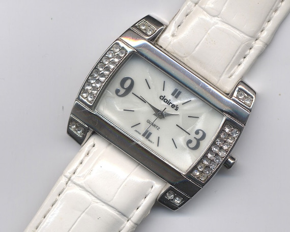 Claire s Fashion Reloj de pulsera analogico silver tone con banda blanca Etsy Espana