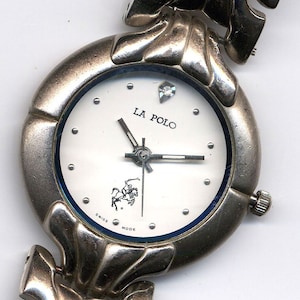 Montre en acier à quartz suisse à cadran blanc pour homme La Polo