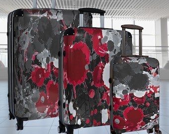 Maleta con salpicaduras de pintura abstracta roja y negra
