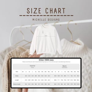 May include: A white crewneck sweatshirt displayed with a size chart titled Michelle Designs. The chart includes Gildan 18000 sizing information in inches and centimeters, detailing width, length, and sleeve length for sizes XS through 5XL.