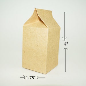 Puede incluir: Una caja de cart&oacute;n marr&oacute;n en forma de cart&oacute;n de leche, con una altura de 4 pulgadas y un ancho de 1,75 pulgadas.