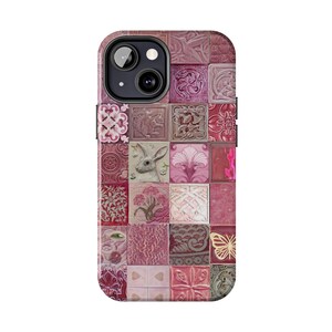 May include: A phone case with a mosaic design featuring various pink and red tiles. The tiles display floral, animal, and geometric patterns. The case has a camera cutout and a magnetic closure.