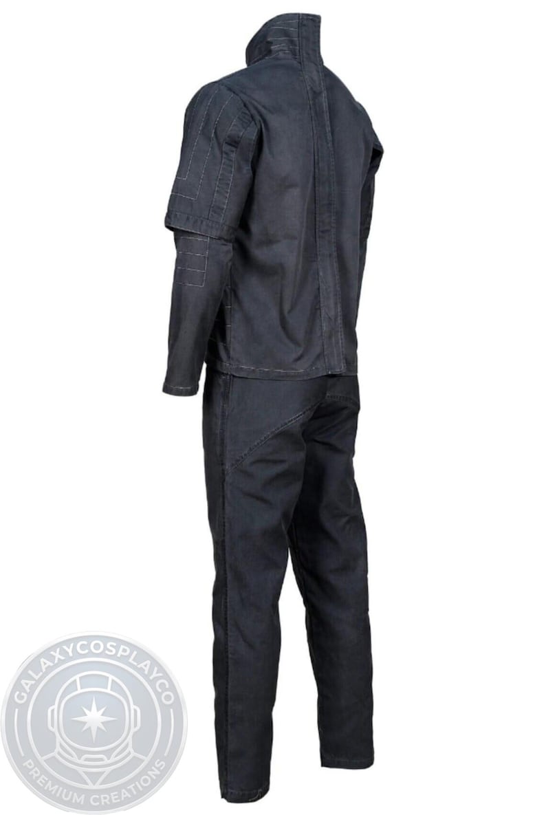 May include: A white ceramic mug with a black handle and the text "But First, Coffee" in a black, handwritten-style font. The mug is on a white surface.