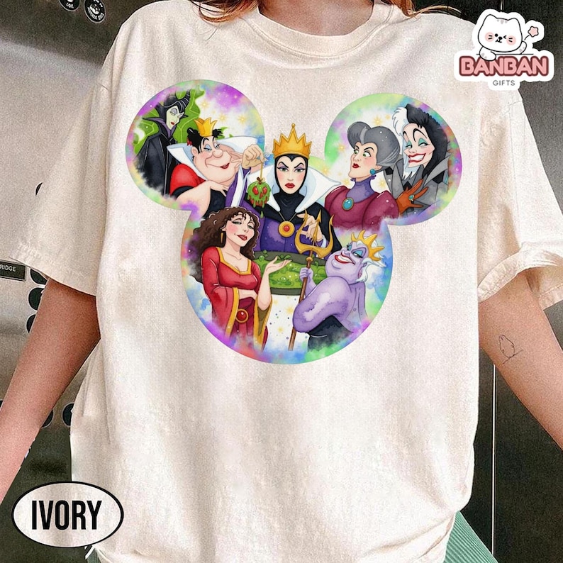 A white t-shirt with a colorful graphic design featuring characters from the Disney animated film "The Evil Queen".