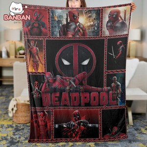 The image is a quilt or blanket featuring various images of the Marvel superhero character Deadpool, including his iconic red and black costume, the iconic red and black mask, and various other images of him in different poses and settings.