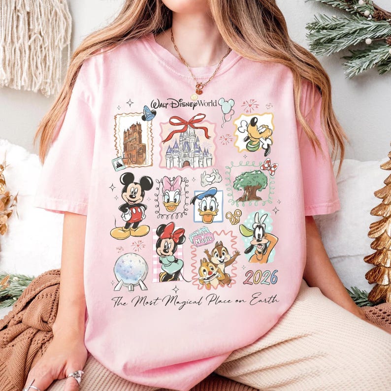 A woman wearing a pink t-shirt with various Disney characters and a text overlay that says "The Most Magical Place on Earth".