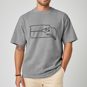 Sam Darnold hand drawn logo shirt featuring a Seattle football team meme design, funny Seattle sports t shirt made for passionate fans, championship winner t shirt with playful hand illustrated artwork, perfect gift for football fan shirt, unisex Seattle football apparel great for game day, tailgating, watch parties, sports bars, casual wear, football season outfits, and Seattle sports lovers looking for a bold meme style tee