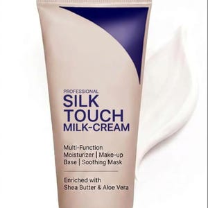 May include: A cosmetic product tube labelled "SILK TOUCH MILK-CREAM". The tube is white and purple, and the product is a multi-function moisturiser, make-up base, and soothing mask. It contains Shea Butter & Aloe Vera.