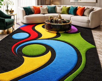 May include: A modern area rug with a black background and a vibrant, abstract design. The rug features flowing shapes in blue, yellow, green, red, and purple. The rug is placed in a living room with a white sofa and colorful throw pillows.